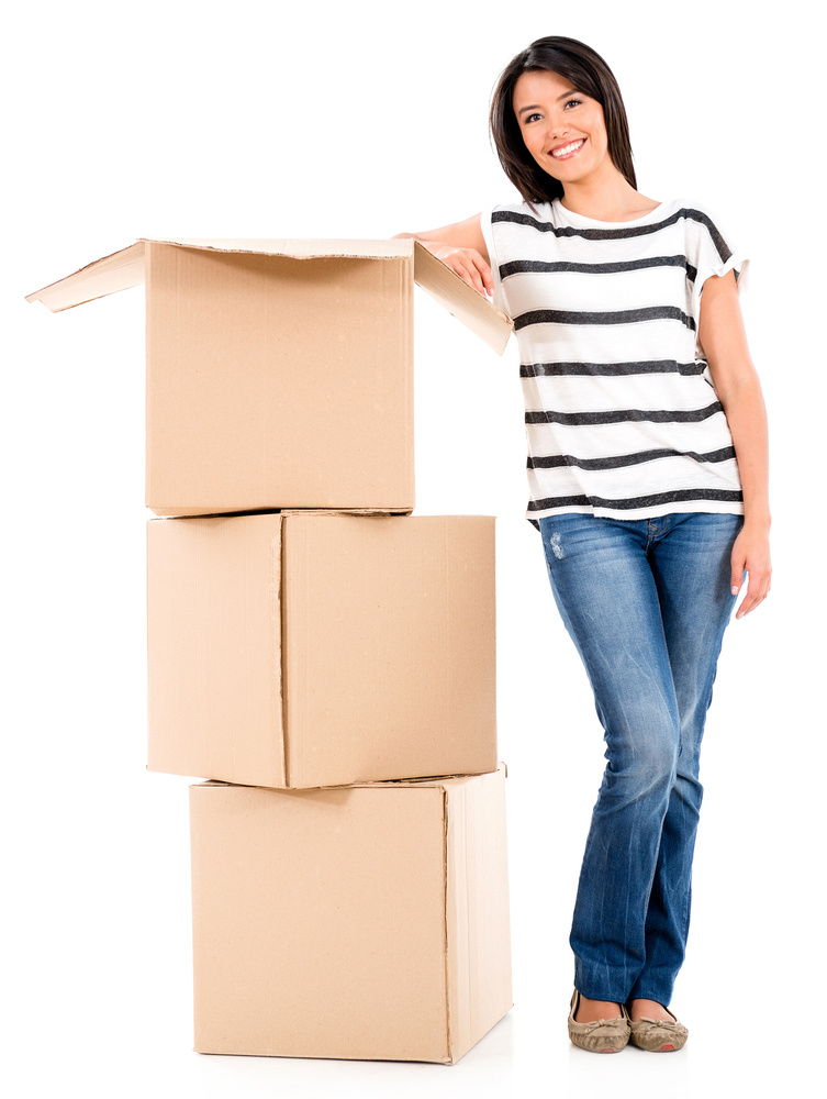 Woman moving house and packing in boxes - isolated over white